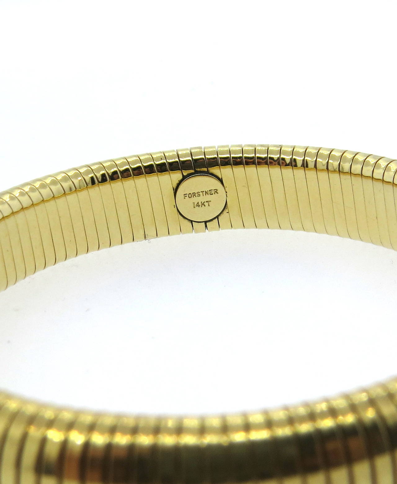 14k gold flexible bangle bracelet
