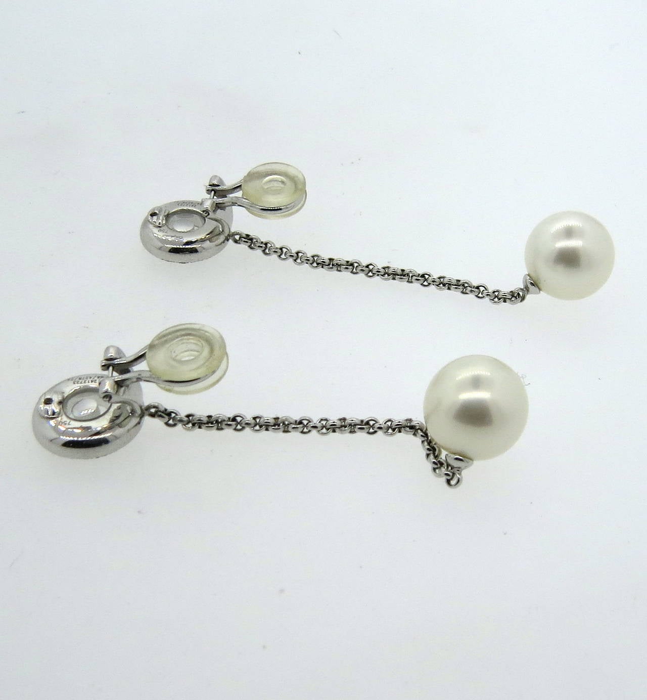 diamond and pearl long drop earrings