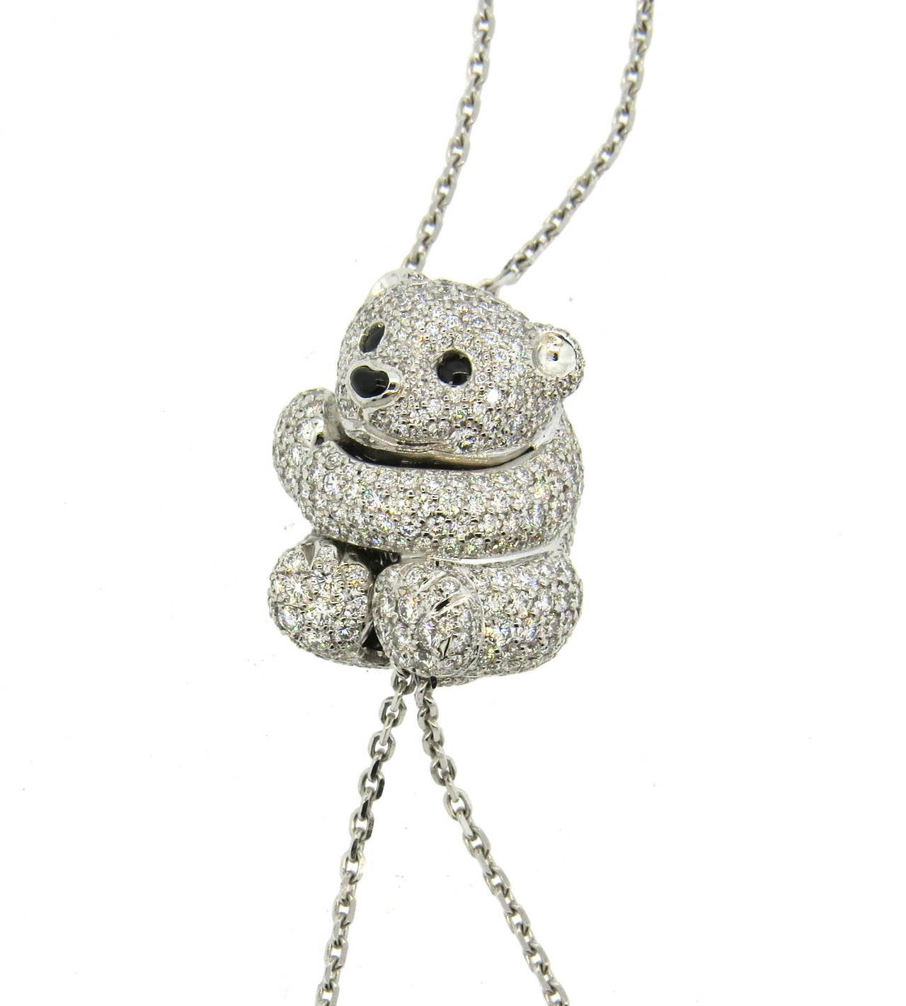 18k white gold chain, featuring bear pendant, crafted in all diamonds (total of 3.85ctw VVS/FG) Necklace is 24