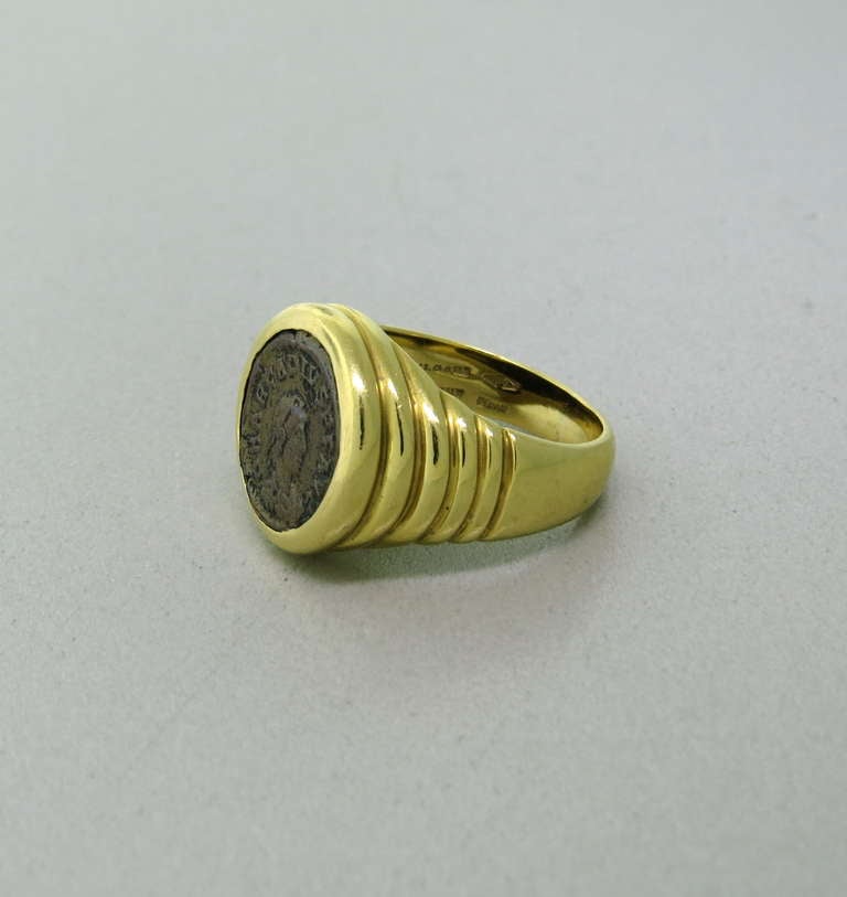 18k yellow gold ancient coin ring by Bulgari. Ring size 6 1/2, ring top is 15.8mm t widest point. Coin - 12.5mm in diameter. Marked Siychia Arcadius Aug,A.D.395 - 408., Blvgari,made in Italy,750. weight - 12.3g Retail approx. $5750.