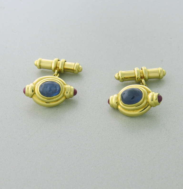 18k yellow gold cufflinks with sapphire and ruby cabochons. Cufflink top - 20mm x 13mm. Marked 750,1055AR. weight 17.2g