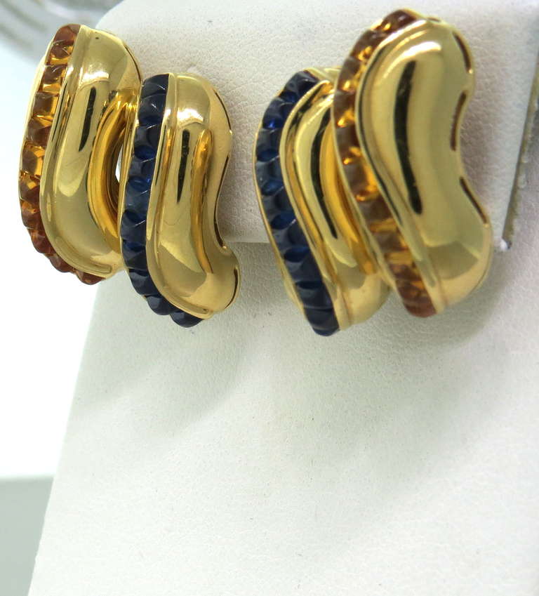 18k yellow gold earrings by Seaman Schepps with sugarloaf cut sapphires and citrines. Earrings are 31mm x 22mm. Marked with Schepps hallmark,750. weight 27.9g