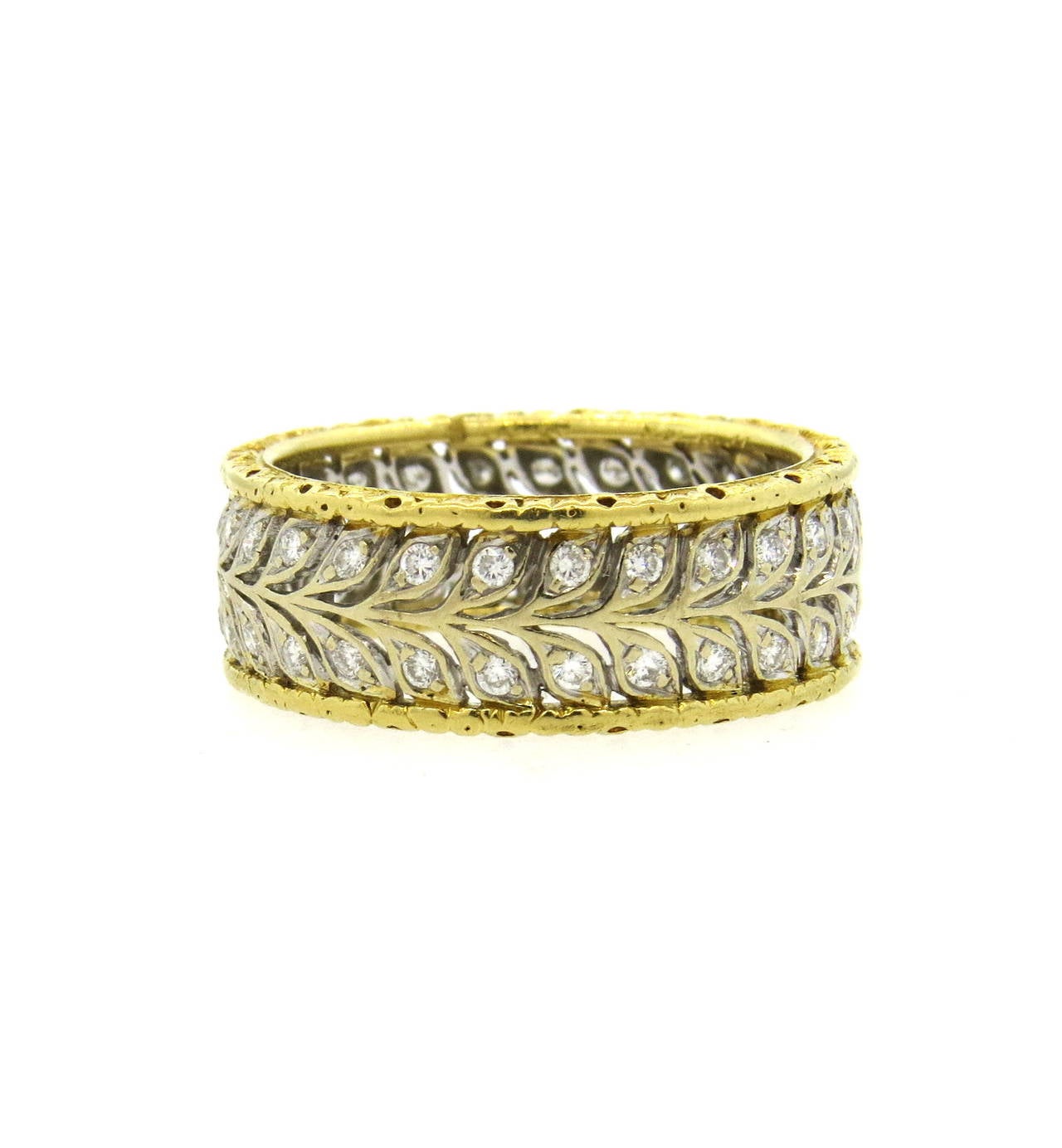 Beautiful 18k gold band ring by Buccellati, adorned with diamonds. Ring is a size 8 and is 8mm wide. Marked Buccellati and 750. Weight of the piece - 6.5 grams