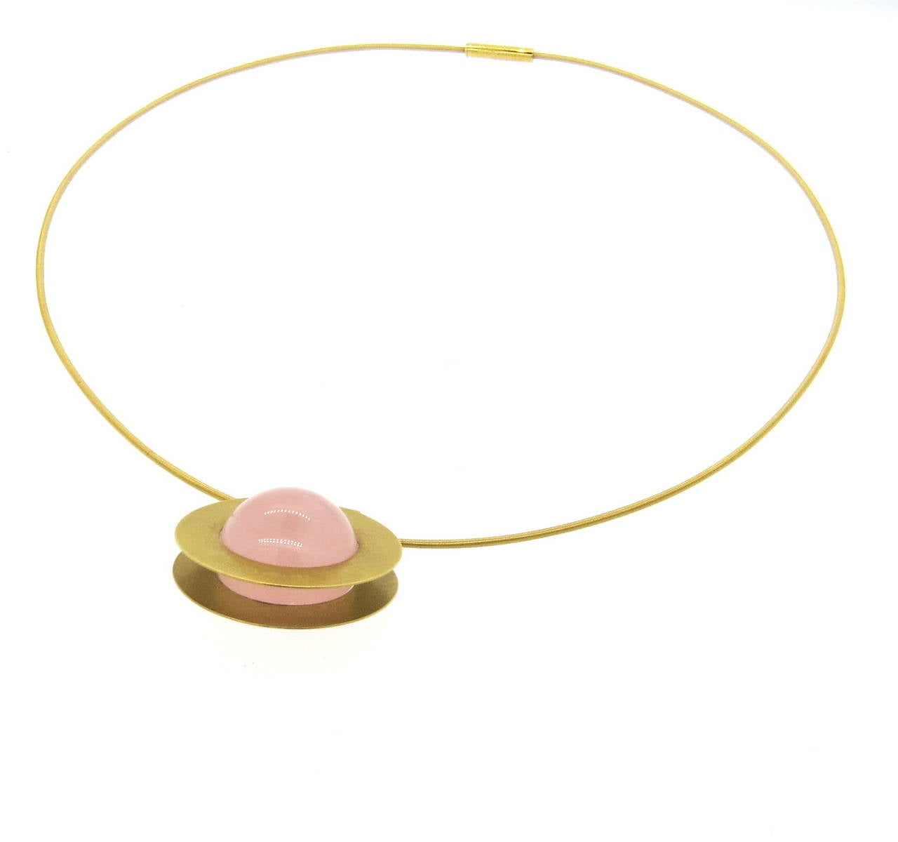 18k gold necklace by Niessing, featuring rose quartz pendant. Necklace is 17 1/2