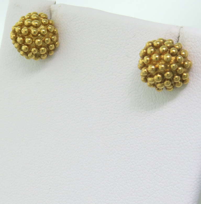 22k gold stud earrings by Julius Cohen. Earrings are 11.4mm in diameter. Marked 22k,Julius Cohen,backs are marked14k/585.   weight - 10.8g