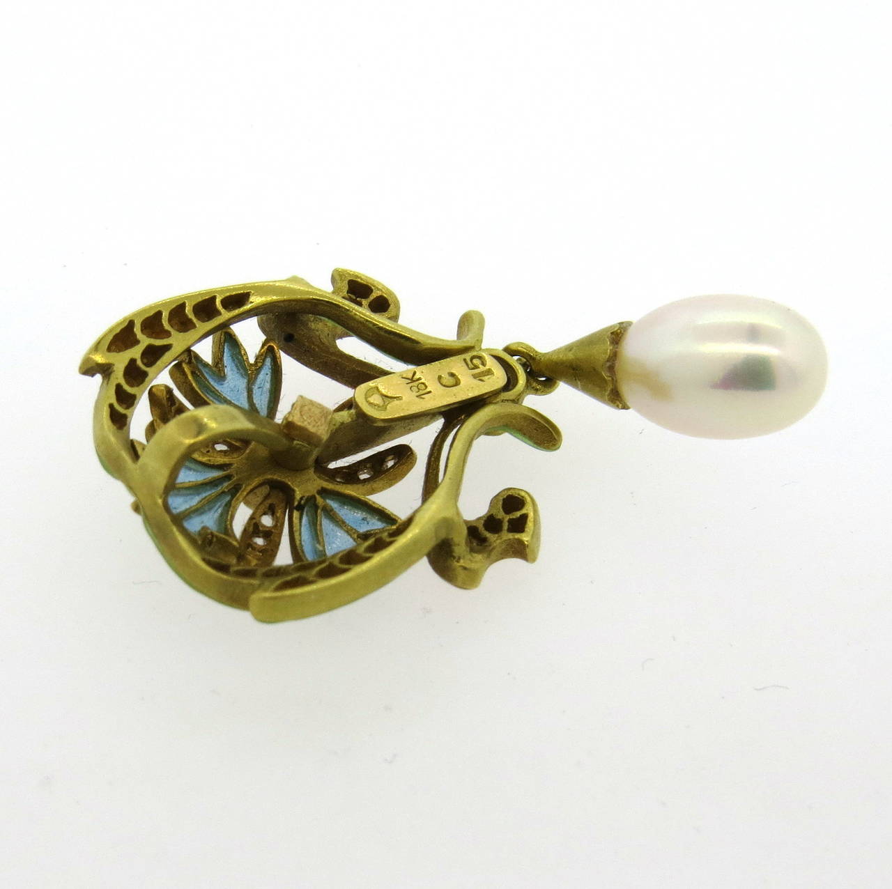 Delicate 18k gold plique a jour brooch, decorated with round brilliant and rose cut diamonds and pearl drop. Brooch measures 40mmin length with the drop x 21mm wide, can be also worn as a pendant. Weight of the piece - 6.4 grams