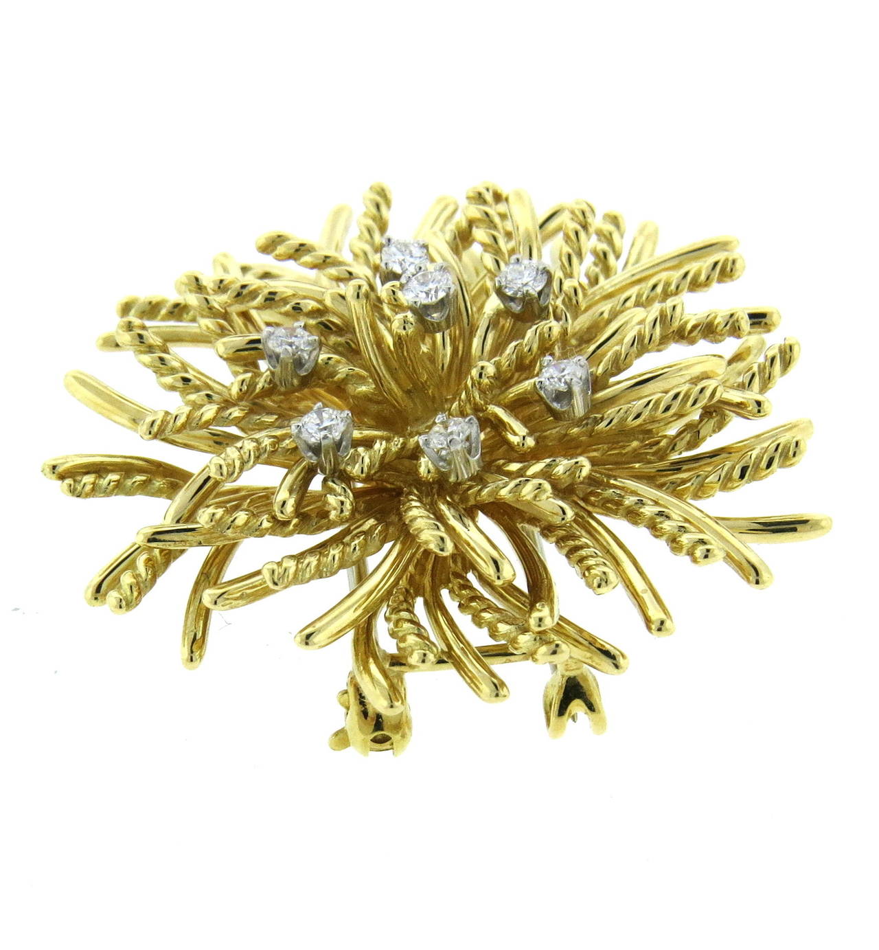 Tiffany & Co. 18k gold anemone brooch, crafted in 18k gold, featuring approximately 0.42ctw in G/VS diamonds. Brooch measures 40mm in diameter, can be also worn as a pendant. Marked 18k and Tiffany & Co. Weight - 25.1 grams