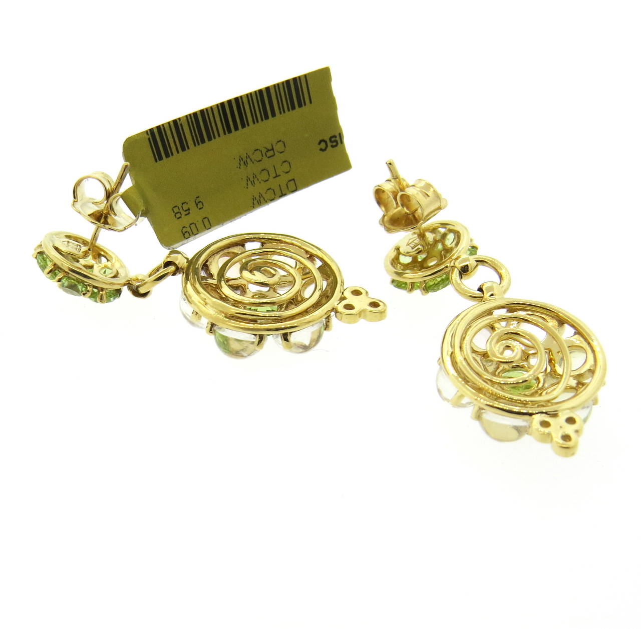 New pair of Temple St. Clair 18k gold earrings from Match collection, featuring 0.09ctw in G/VS diamonds, moonstones and peridot. Earrings measure 35mm x 16mm. Marked 750 and Temple hallmark. Weight - 10.9 grams