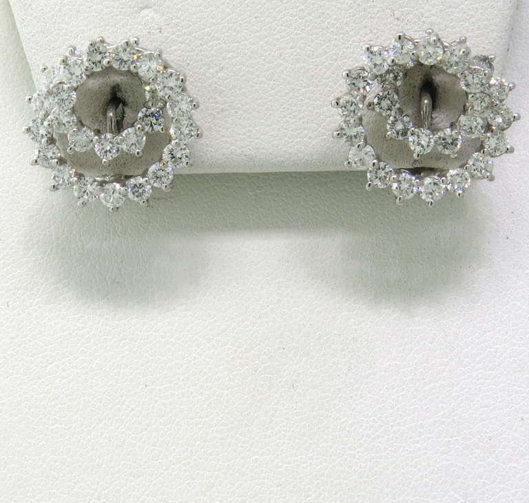 Beautiful platinum earrings with 2.54ctw diamonds by Tiffany & Co. Earrings are 17mm x 17mm. Marked Tiffany & Co,pt950. weight 10.8g