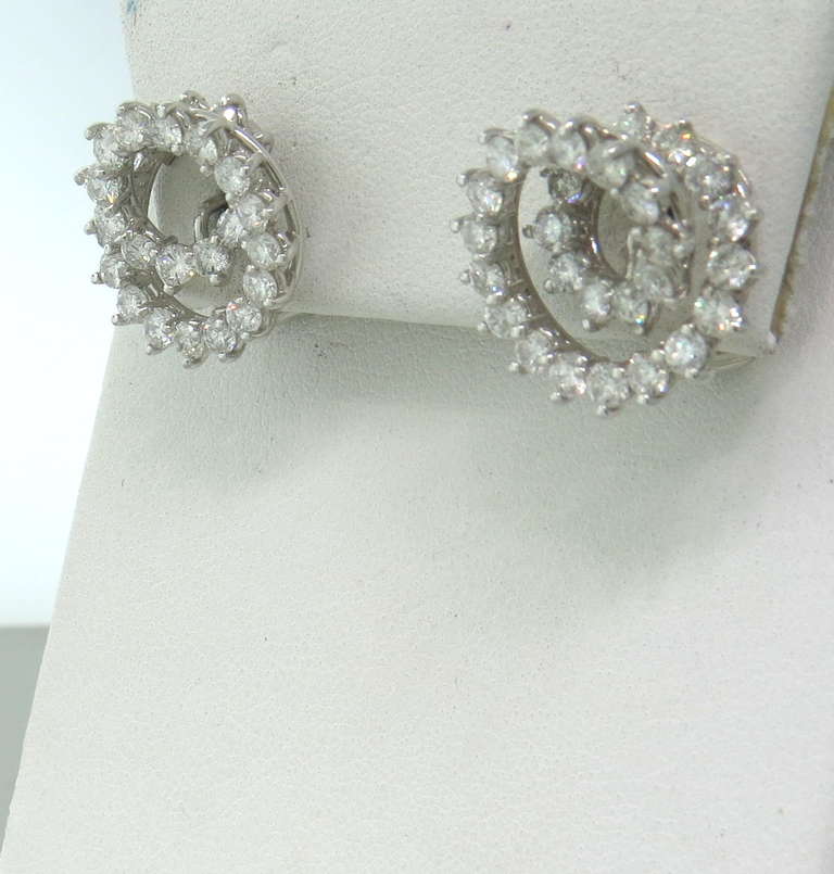 Co Platinum Diamond Swirl Earrings 