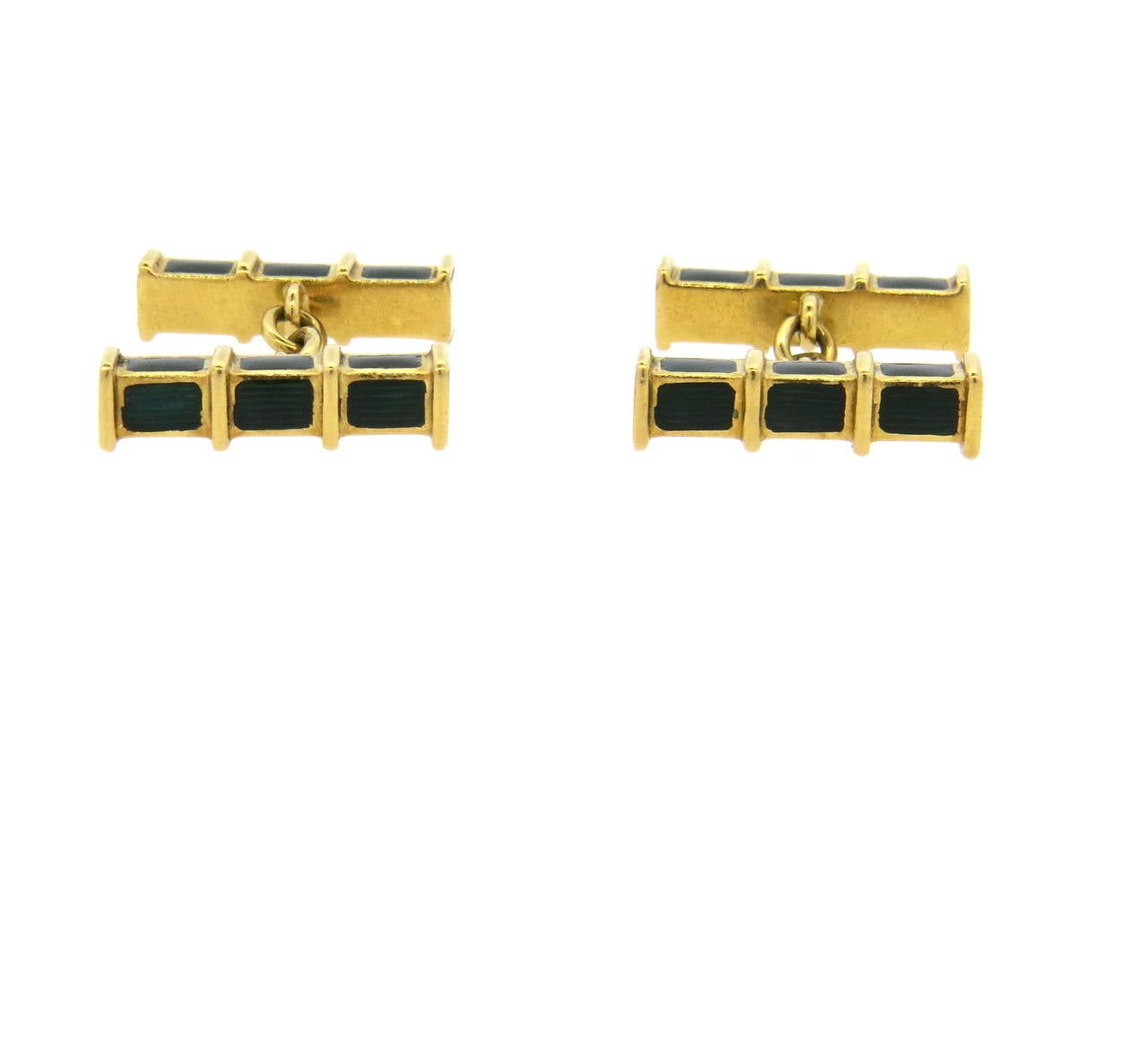 A pair of 18k yellow gold cufflinks coated with green enamel.  The cufflinks measure 20mm x 5mm and weigh 15.2 grams