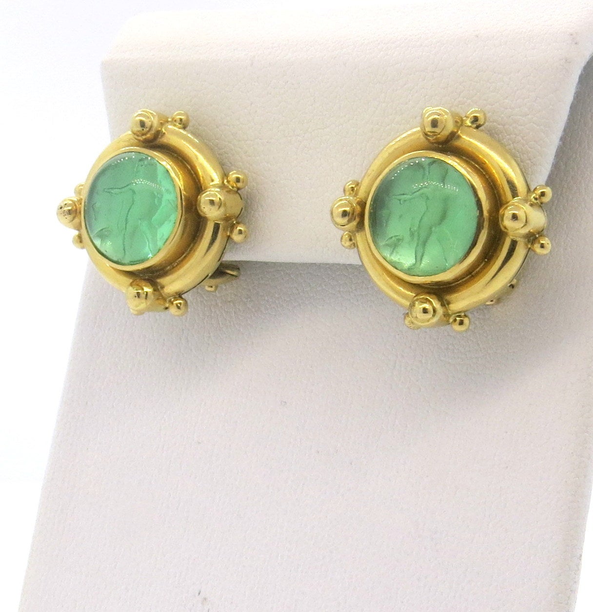 18k gold earrings, by Elizabeth Locke, featuring mother of pearl, covered with green Venetian glass. Earrings are 20mm x 20mm, with collapsible posts. Marked with Locke hallmark and 18k. Weight - 15.2 grams