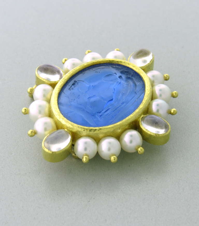 Large 18k yellow gold brooch/pendant by Elizabeth Locke with venetian glass intaglio,supported by mother of pearl back,surrounded with 6mm pearls and 4 7.2mm x 5.4mm moonstone cabochons. Brooch is 47mm x 42mm, intaglio - 27mm x 21mm. Marked with