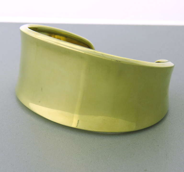 18k yellow gold cuff bracelet by Robert Lee Morris - will fit up to 7