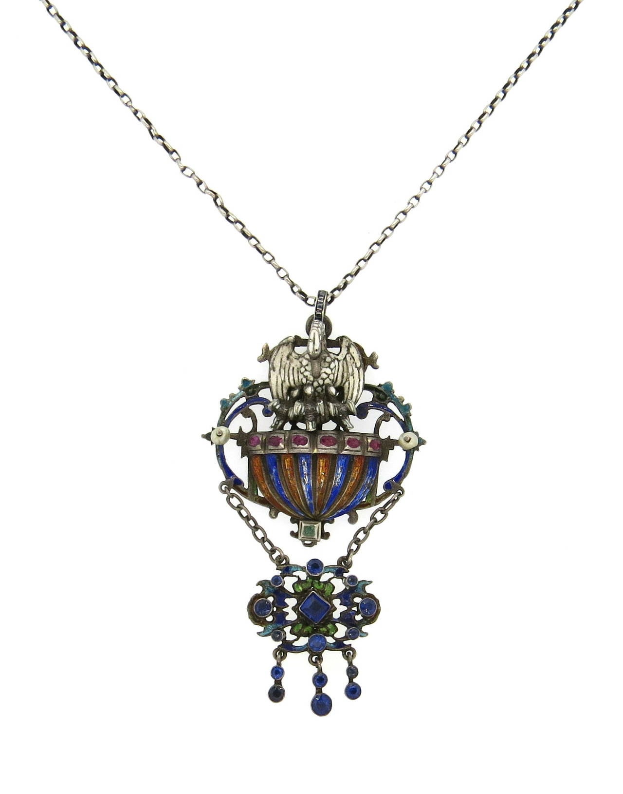 Antique silver Austro-Hungarian pendant, decorated with gemstones and multicolor enamel, suspended on a silver chain. Necklace is 16 7/8