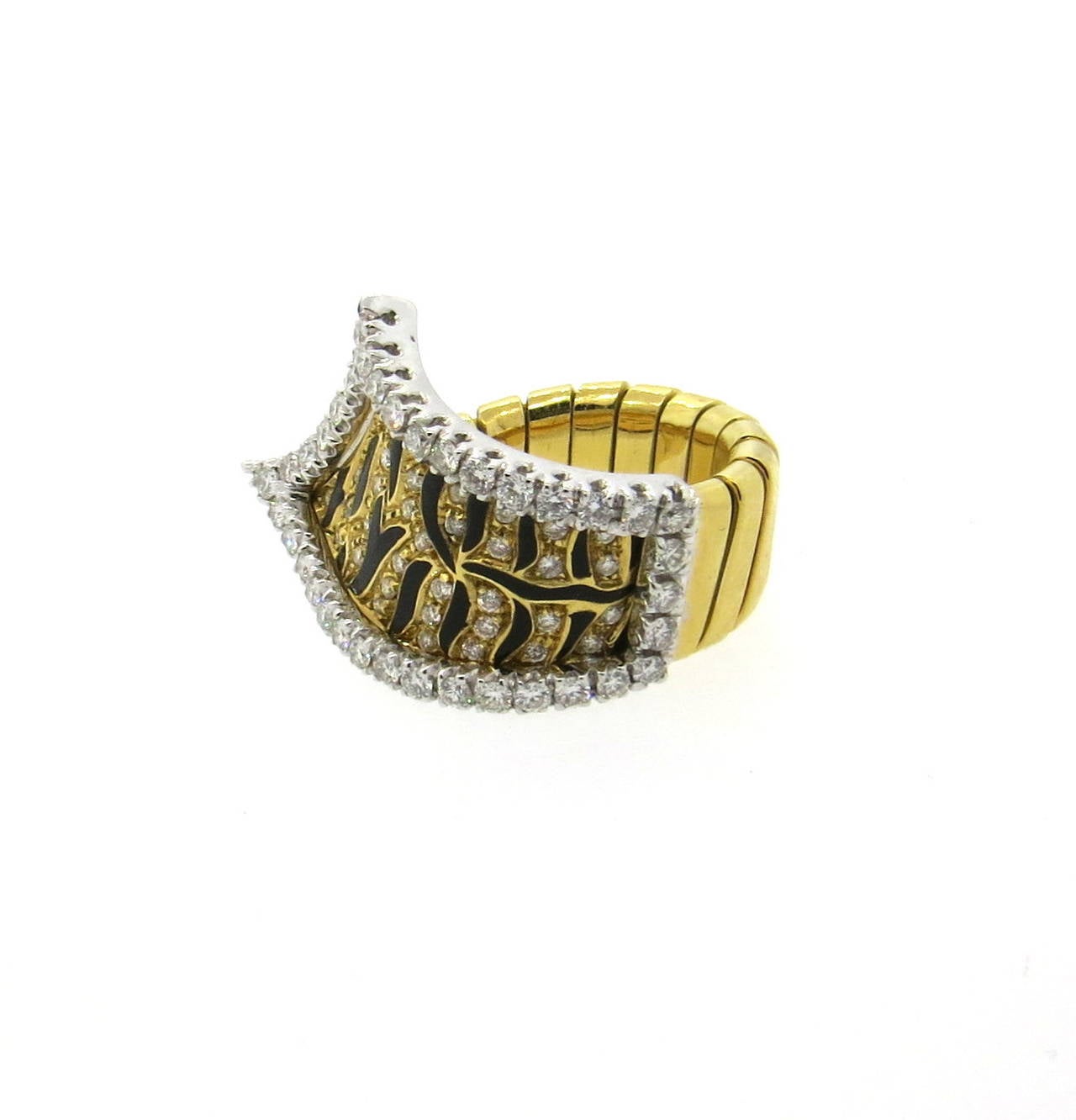 18k gold ring, decorated with approximately 1.20ctw in FG/VS diamonds and black enamel, featuring tiger stripes. Ring is a size 6 (slightly flexible) , ring top is 16mm x 30mm. Weight of the piece - 16 grams