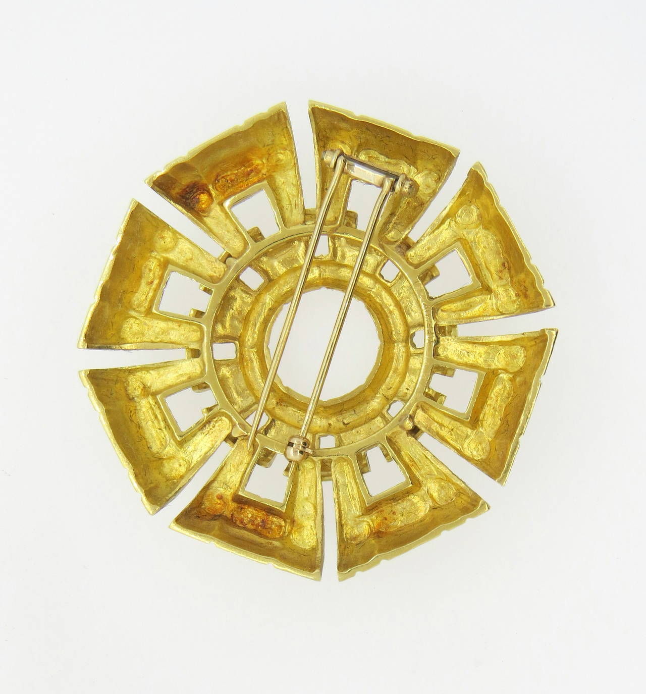 18k gold large brooch, crafted by Tiffany & Co. Measuring 55mm in diameter. Marked Tiffany & Co and 18k. Weight of the piece - 53 grams