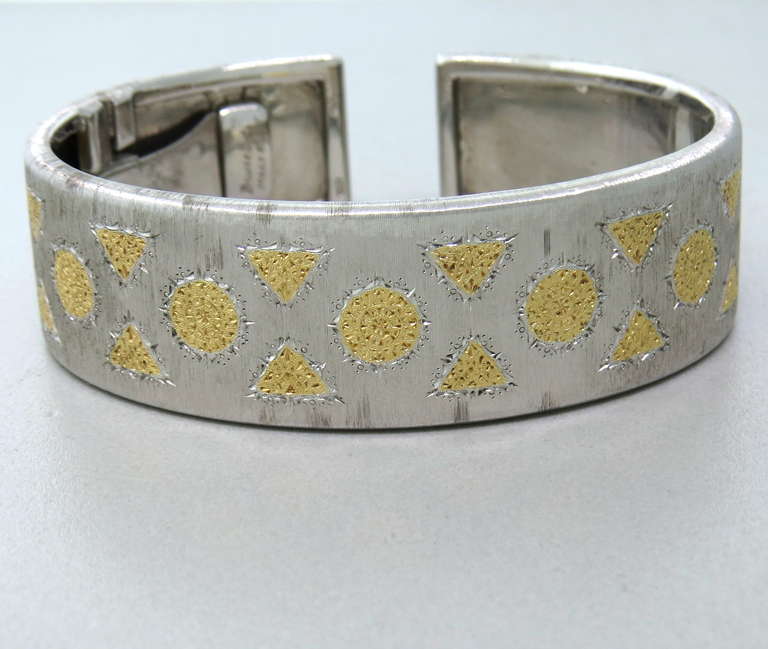 18mm wide open cuff bracelet  in 18k gold and silver , current retail price $23,000.00, excellent condition, with original box.