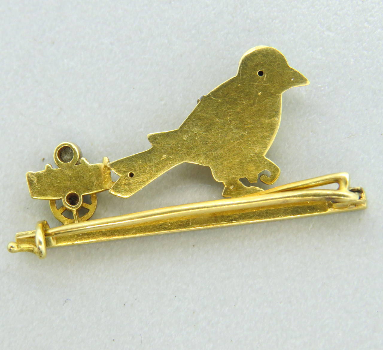 Antique bird brooch, crafted in 18k gold and platinum, decorated with rose cut diamonds. Brooch measures 35mm x 17mm. Weight of the piece - 4.8 grams