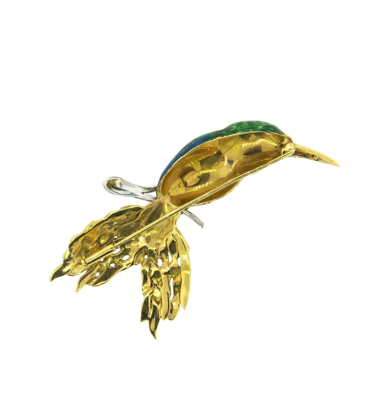 Beautiful 18k gold bird brooch, set in multicolor enamel with blue sapphires. Brooch is 75mm x 40mm. Weight of the piece - 21.3 grams