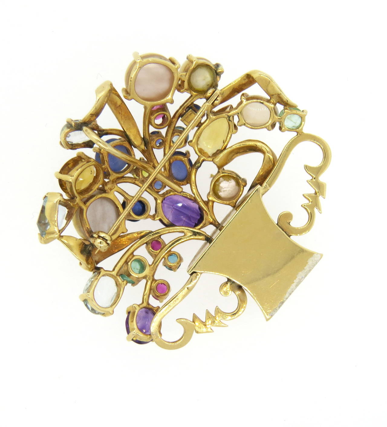 Beautiful and colorful Retro brooch, set in 14k gold. Brooch can be also worn as a pendant, set with pearls and multicolor gemstones. Piece measures 54mm x 55mm and weights 32 grams