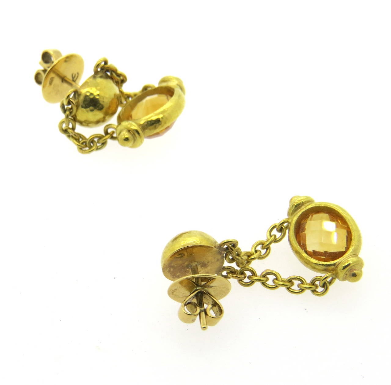 A pair of 18k yellow gold earrings set with faceted citrine.  Crafted by Elizabeth Locke, the earrings measure 35mm x 18mm and weigh 12.3 grams.