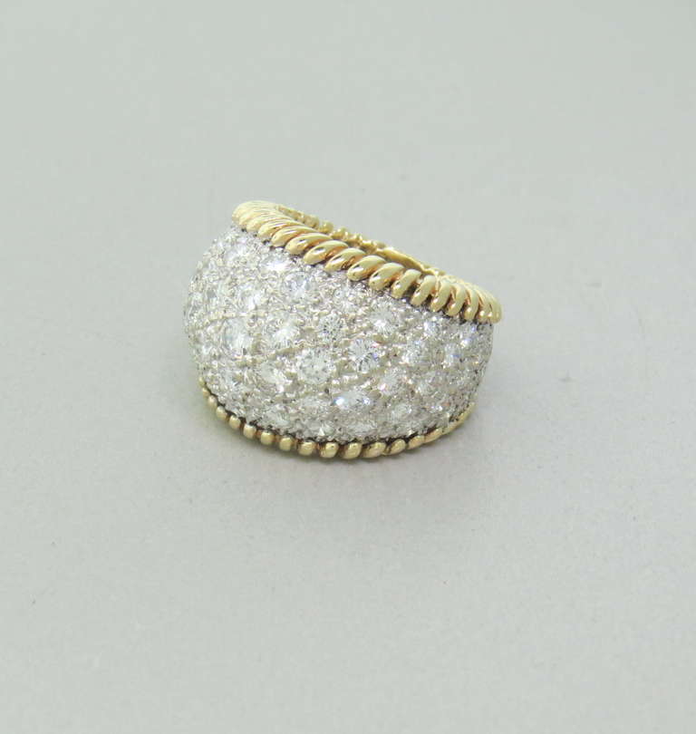 Metal: 18k Yellow Gold
Diamonds - approx. 4.00ctw H/VS
Dimensions: Ring Size: 5.5, 17mm Widest Point
Weight: 11.1g