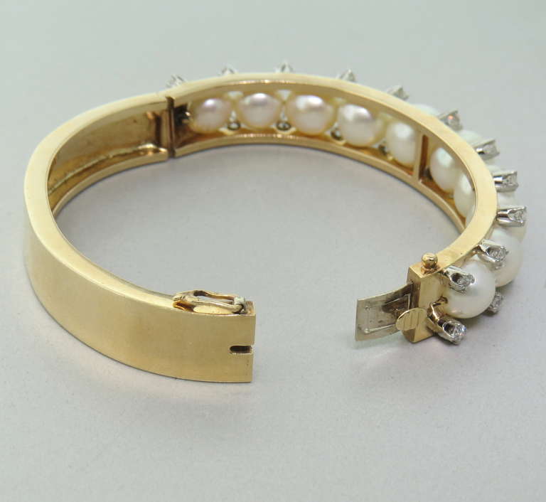 Mid Century Gold Pearl Diamond Bangle Bracelet In Excellent Condition In Lambertville, NJ