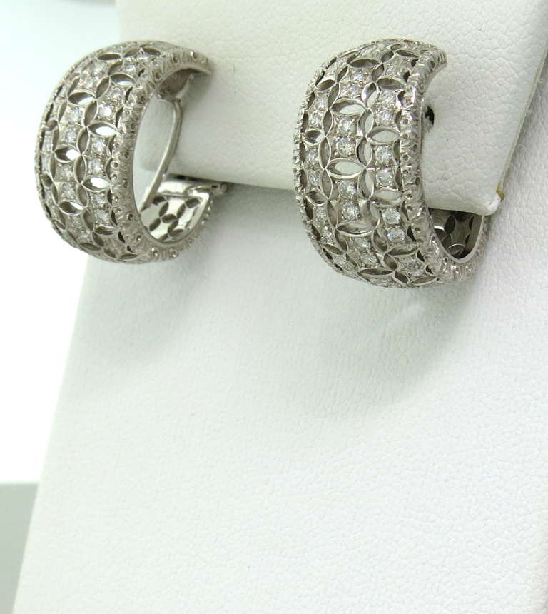 Beautiful 18k white gold earrings with diamonds by Mario Buccellati. Earrings measure 20mm x 11.58mm. Marked M.Buccellati,750,Italy. weight 14.3g