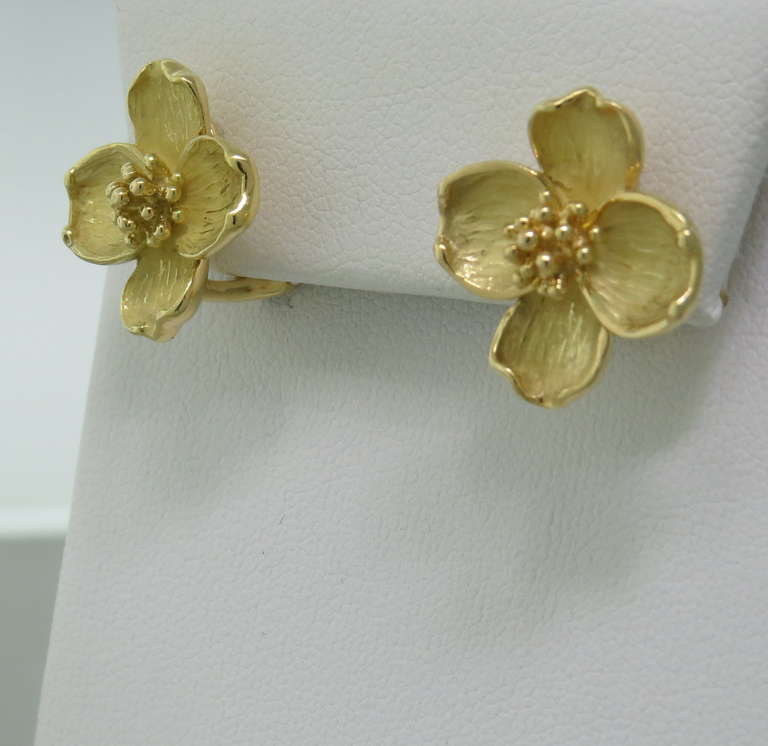 18k yellow gold earrings by Tiffany & Co in dogwood flower design. Earrings are 19mm x 16mm. marked 750,T & Co. weight 11.7g