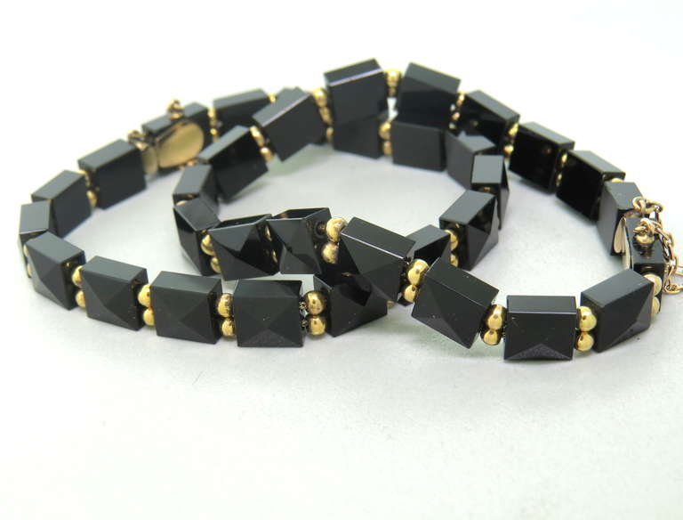 Antique Victorian 14k gold bracelet set with black onyx gemstones. Bracelets are 7