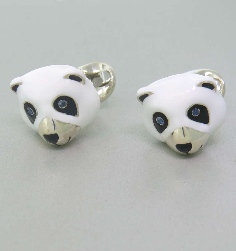 Brand new pair of Deakin & Francis sterling silver cufflinks featuring black and while enamel panda bear heads - measuring 19mm x 16mm. Marked Deakin & Francis, 925. Weight - 26.5g. Come with box and papers.