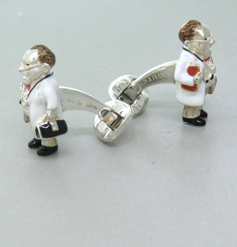 Brand new pair of Deakin & Francis sterling silver and enamel doctor cufflinks  measuring 25mm x 16mm. Marked Deakin & Francis, 925. Weight - 27.4g. Come with box and papers
