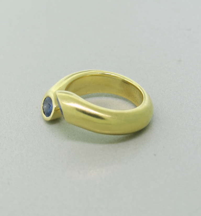 Metal: 18k Yellow Gold
Gemstone: Iolite - 4.2mm x 3.3mm
Ring Size 2 1/2, French Size 42. Ring Is 4.7mm Wide
Weight: 8.9 grams