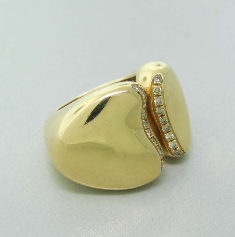 Metal: 18k Yellow Gold
Diamonds: approx. 0.20ctw VS / G-H
Ring Size: 6
Ring is 19.8mm Widest Point
Weight: 21.2 grams