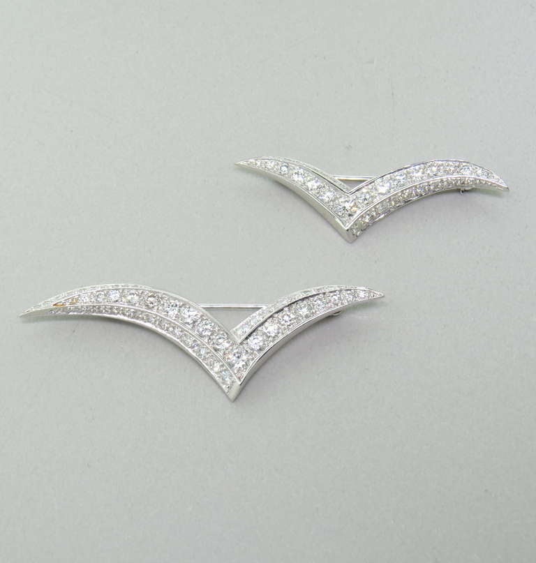 Metal: Platinum
Diamonds: approx. 2.80ctw VS / G
Dimensions: 56mm x 21mm & 41mm x 12mm
Weight: 10.2 grams (for both)