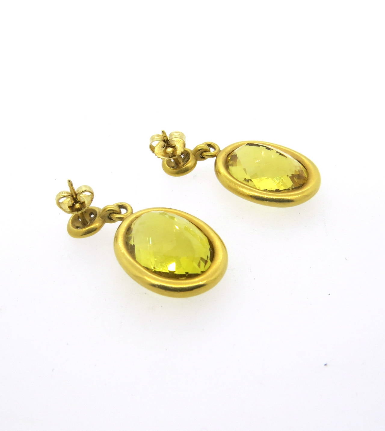 Lovely 18K gold earrings by Linda Lee Johnson featuring brilliant cirtrine drops accented by approximately 0.40ctw of diamonds. Earrings measure 35mm long x 18mm at widest points. Marked with makers hallmark, weigh 19.5 grams.