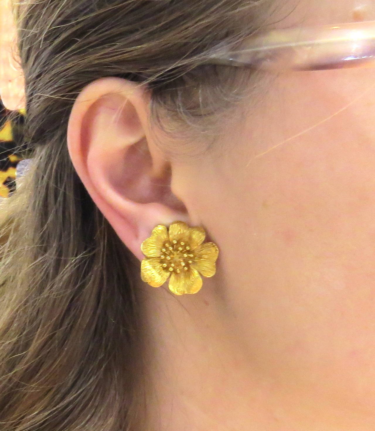 Lovely Ilias Lalaounis 18k gold textured flower earrings. Earrings measure approximately 22mm x 15mm. Marked A21, 750, Greece. Weigh 13.7 grams.
