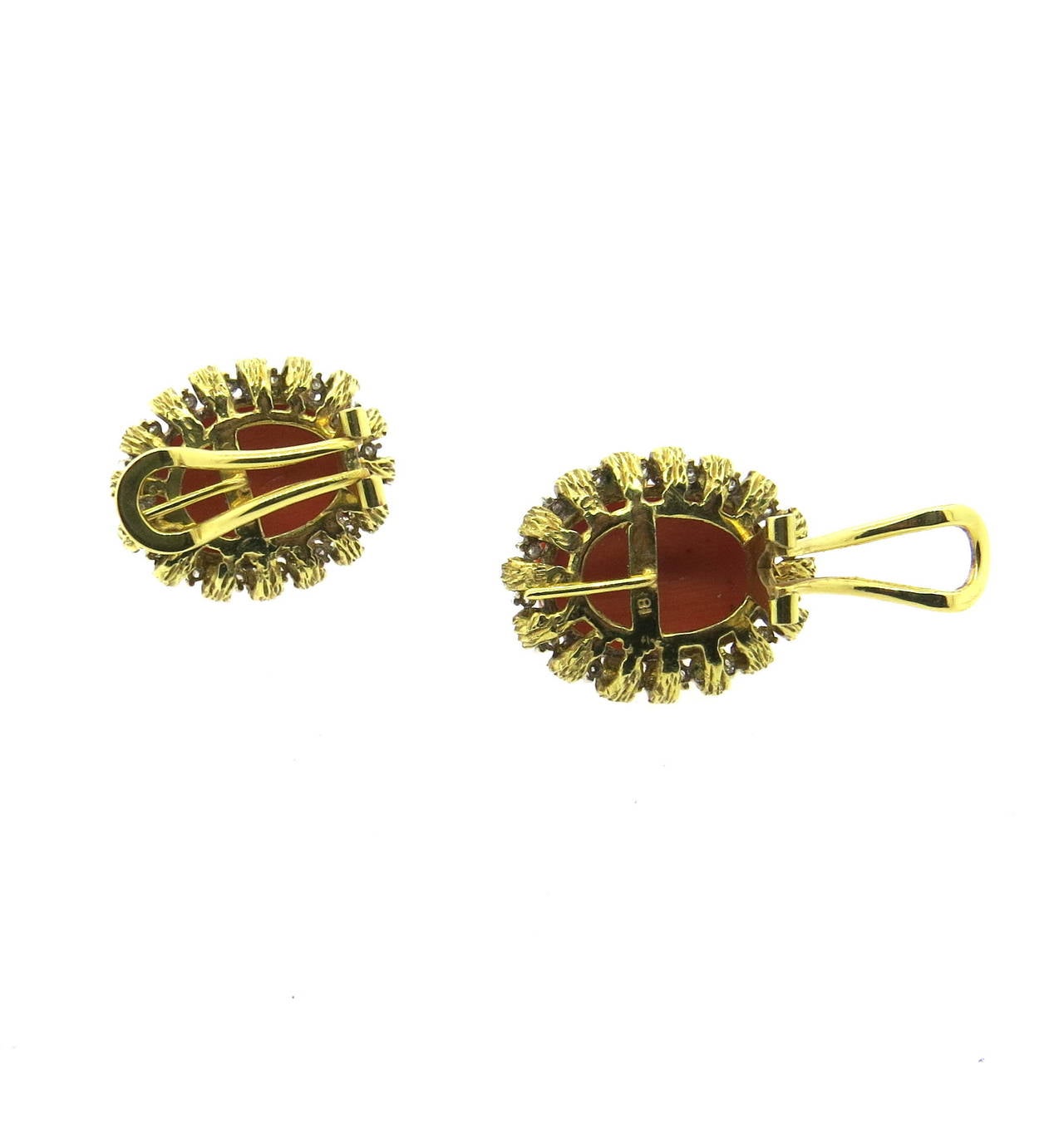 Vintage 18k gold earrings, set with 20mm x 14.7mm carved coral stones in the center, surrounded with diamonds. Earrings measure 25mm x 20mm.  Weight - 21.8 grams