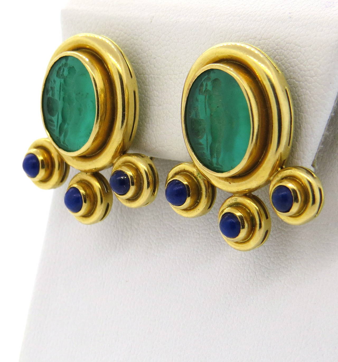 Stunning 18K gold Elizabeth Locke earrings featuring classic intaglio Venetian glass and lapis. Earring measure 29mm long x 27mm at widest point. Marked with Locke hallmark, 18K. Weight of earrings - 22.0 grams.