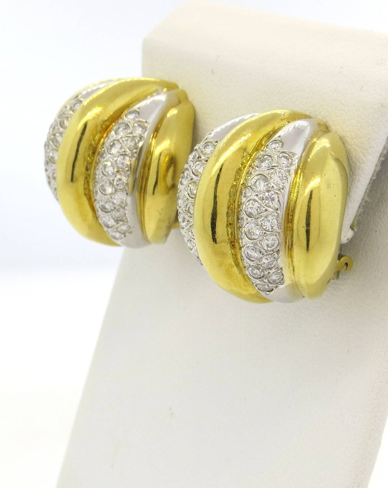 Massive 18k gold dome earrings, set with approximately 2.8ctw in diamonds. Earrings are 25mm x 25mm, and sit approx. 15mm from the ear. Weight - 39.3 grams