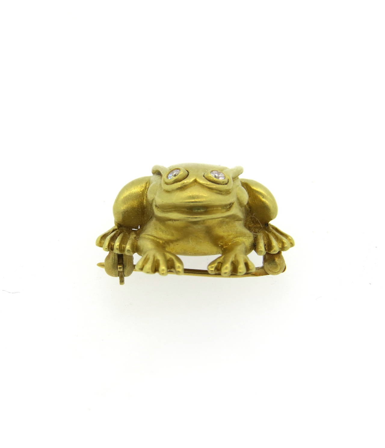 Adorable 18K gold Barry Kieselstein-Cord frog brooch featuring diamonds for eyes. Pin measures 25mm x 23mm. Marked Kieselstein Cord 750, weighs 12.0 grams.