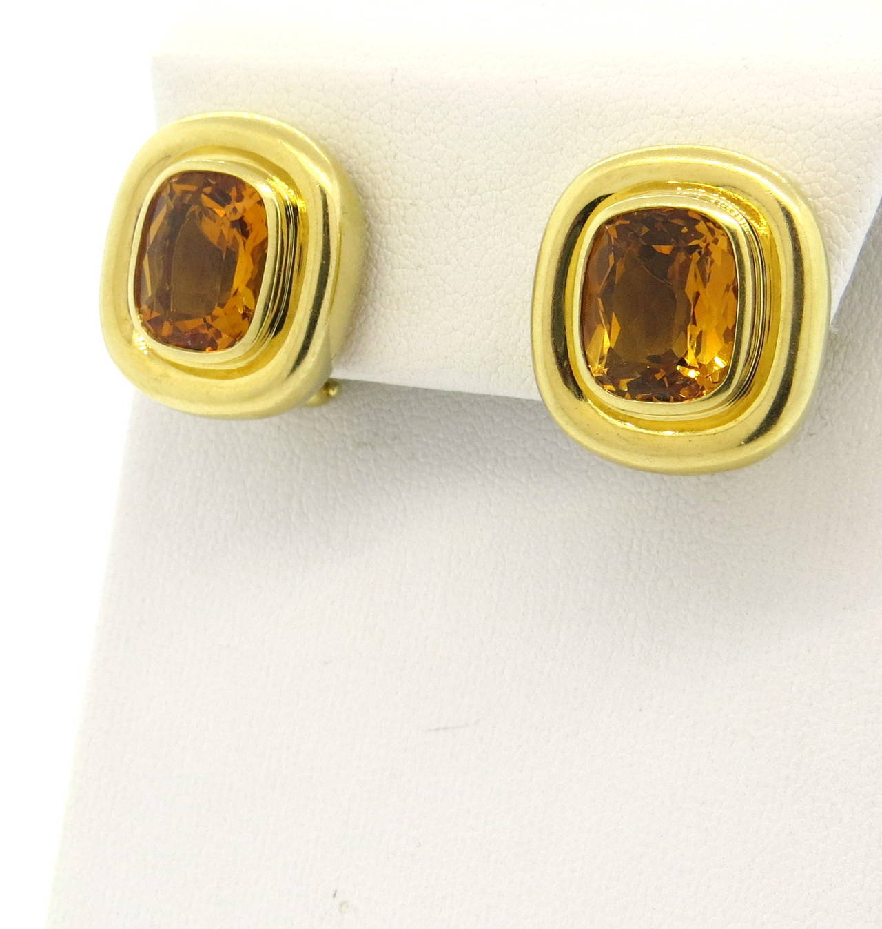 18k yellow gold earrings, crafted by Paloma Picasso for Tiffany & Co, featuring 11.5mm x 9.5mm citrines, approximately 4ct each. Earrings measure 20mm x 18mm. Marked Paloma Picasso,750, Tiffany & Co. Weight - 20.8 grams