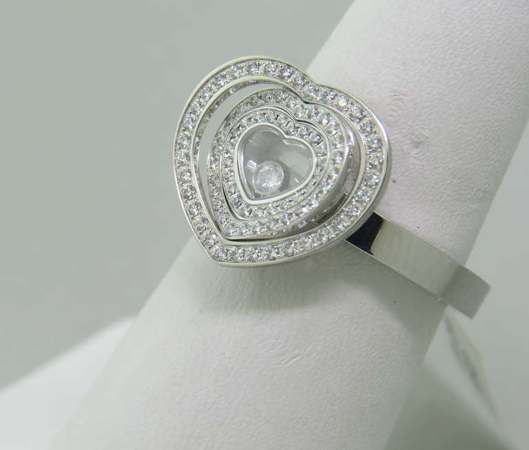 Chopard 18k white gold ring from Happy Spirit collection,featuring  approx. 0.39ctw diamonds. Heart top measures 14mm x 15mm. ring size 6 1/2. Marked 827983,3267074,au750,Chopard. weight - 7.8g
Current Retail $8900