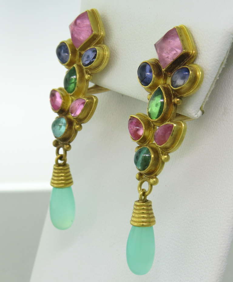 Lively and colorful earrings my Maija Neimanis in 22k gold.  A colorful combination of Peridots, Pink & Green Tourmalines, Aquamarines, Iolites and Green Quartz.  Earrings are 55mm x 20mm and weigh 23.2 grams.