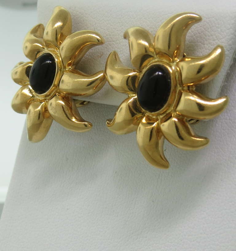 Vintage 18k gold earring by Tiffany & Co. with onyx gemstones in the center. Earrings measure 28mm x 27mm. weight - 22.4g