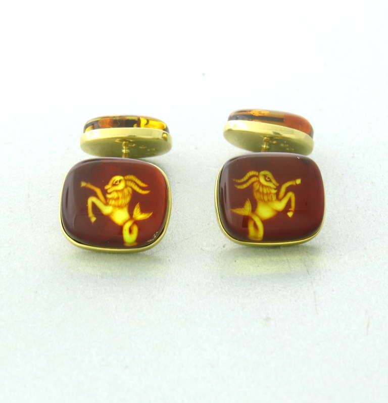 18k gold trianon zodiac sign cufflinks with amber - top of the cufflink is 15mm x 13mm. Marked Trianon and 750. weight - 7.9g