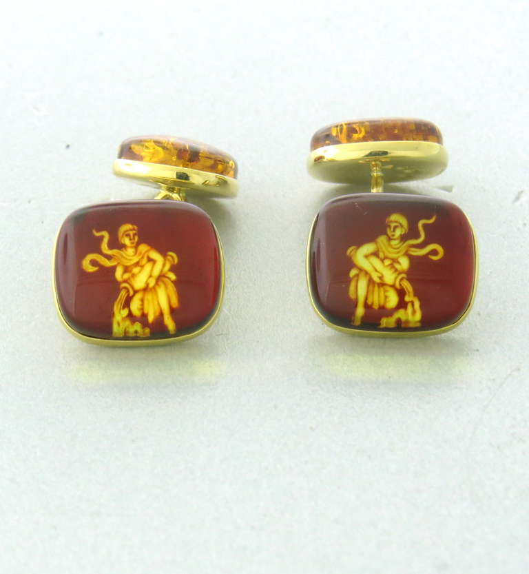 18k gold cufflinks by Trianon with amber Aquarius zodiac sign. Cufflink top is 15mm x 12.8mm. Marked Trianon and 750. weight - 7.9g