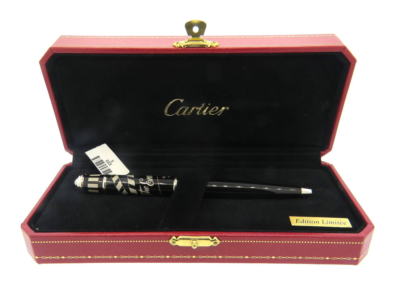Lovely Limited Edition Cartier Diabolo black lacquer ballpoint pen featuring a cinema design reading 