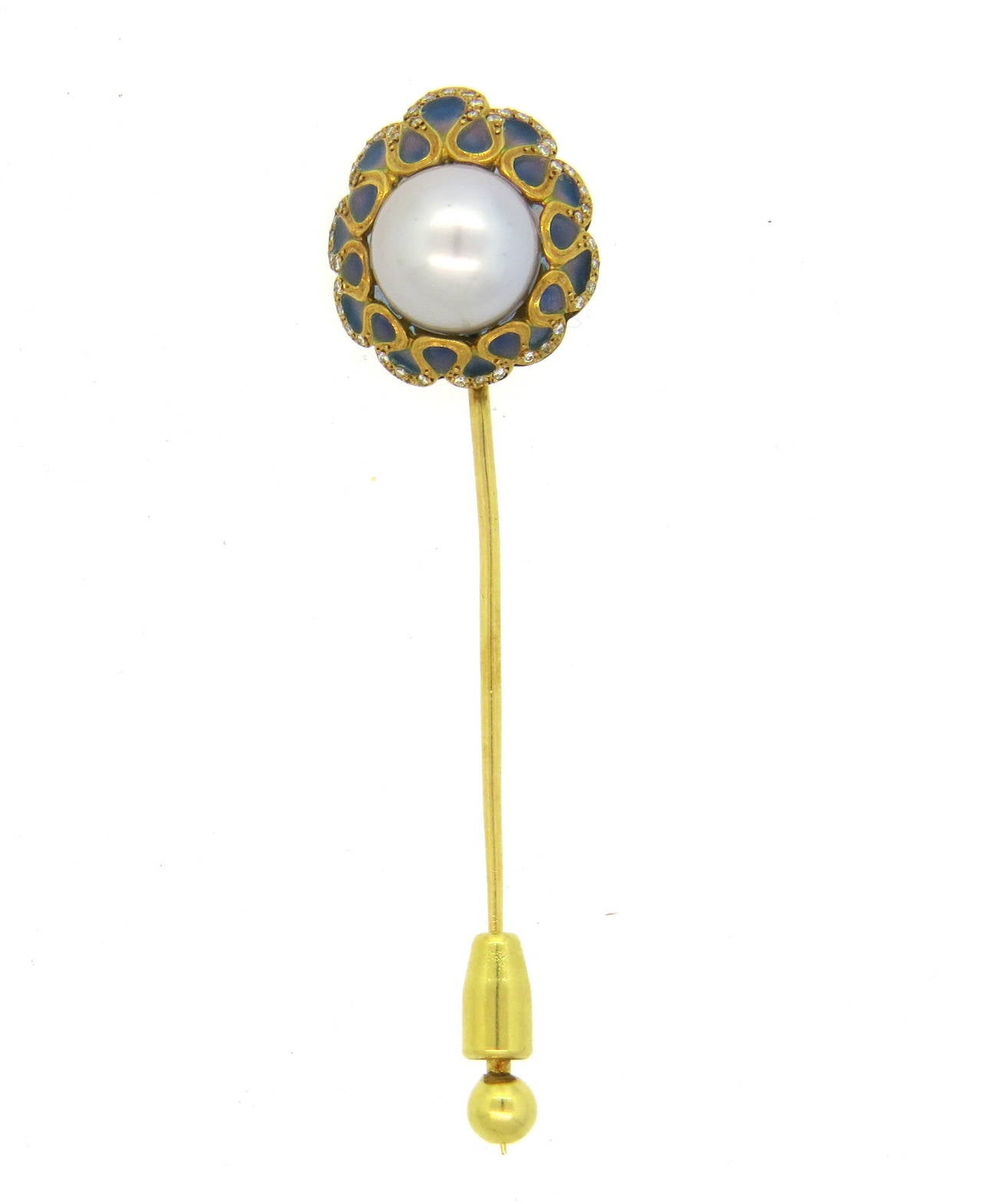 An 18k yellow gold stick pin adorned with plique a jour enamel, approximately 0.08ctw of H/VS diamonds and a South Sea pearl measuring 12.5mm in diameter.  The head of the pin measures 20mm x 24mm.  The weight of the piece is 11.2 grams.